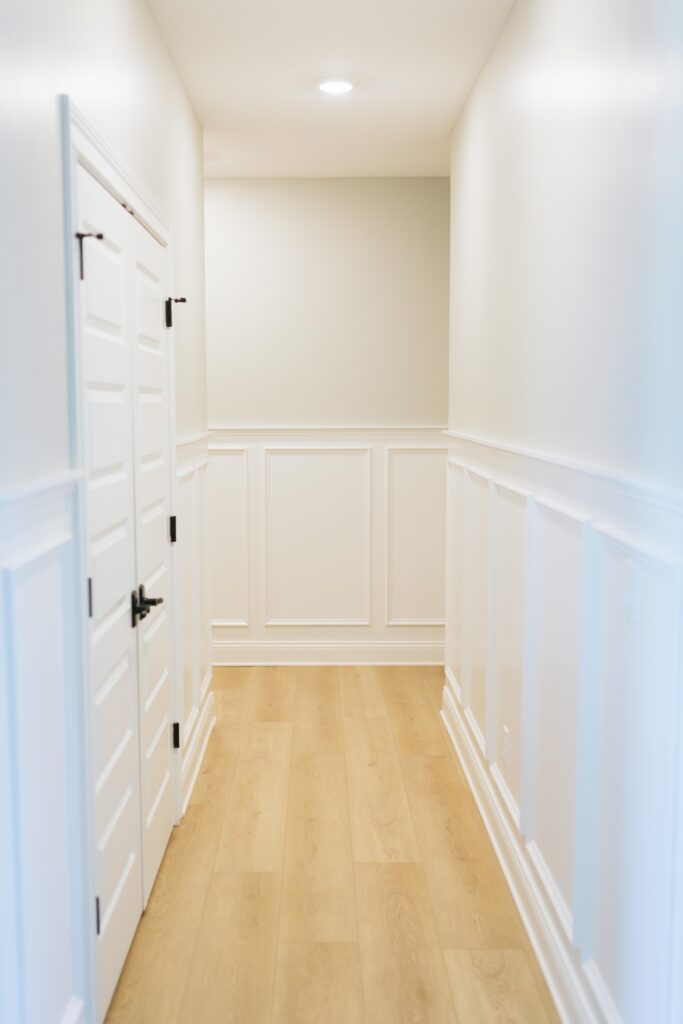 Hallway with trim boxes lining the sides. 